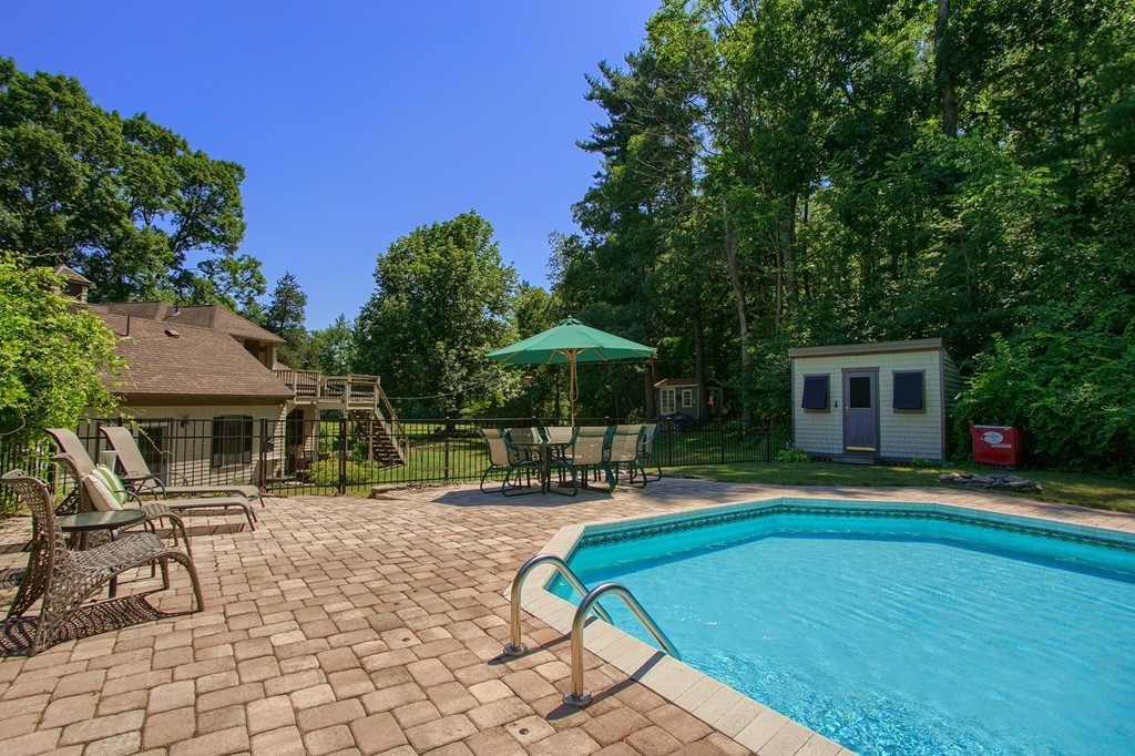 45 Hill Road Groton, MA 01450 - Photo 6 of 30 a view of a house with backyard porch and sitting area