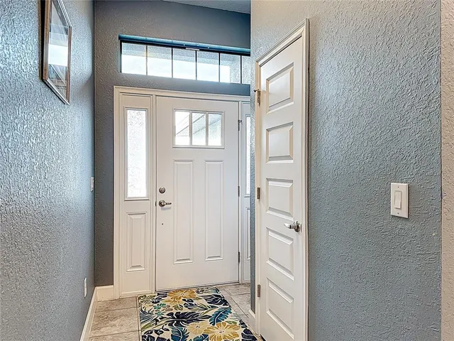 a view of livingroom with furniture and window