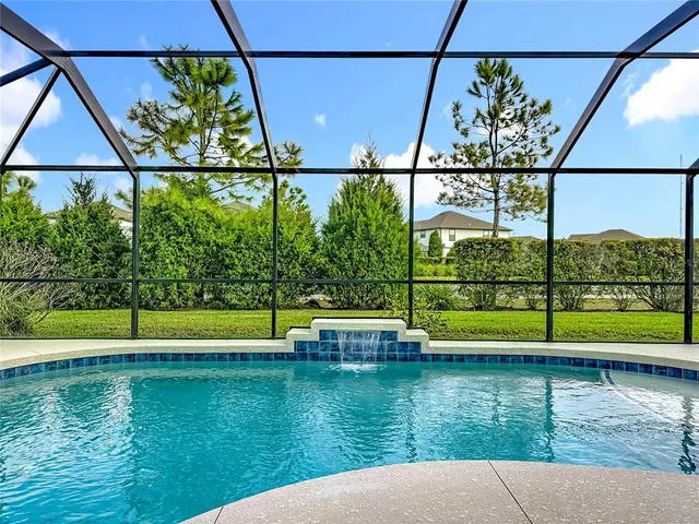a view of a swimming pool with a from a balcony