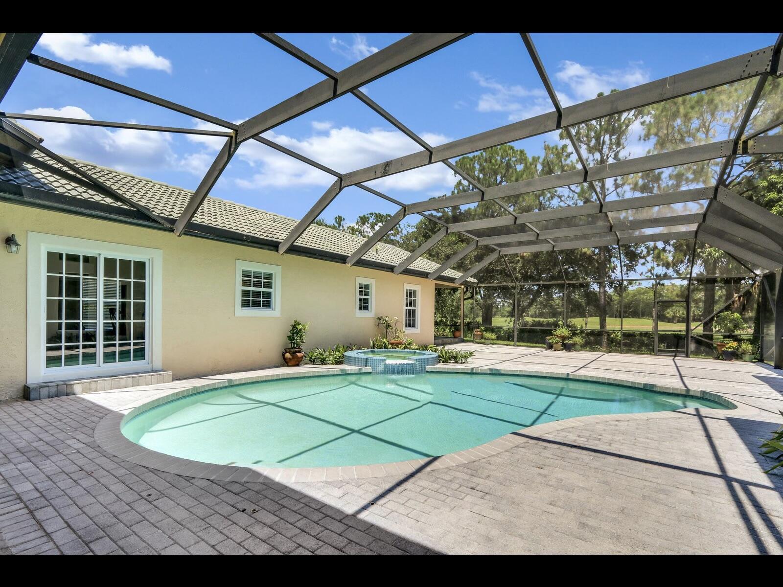 1856 Southeast Colony Way Jupiter, FL 33478 - Photo 4 of 10 a view of a house with a yard