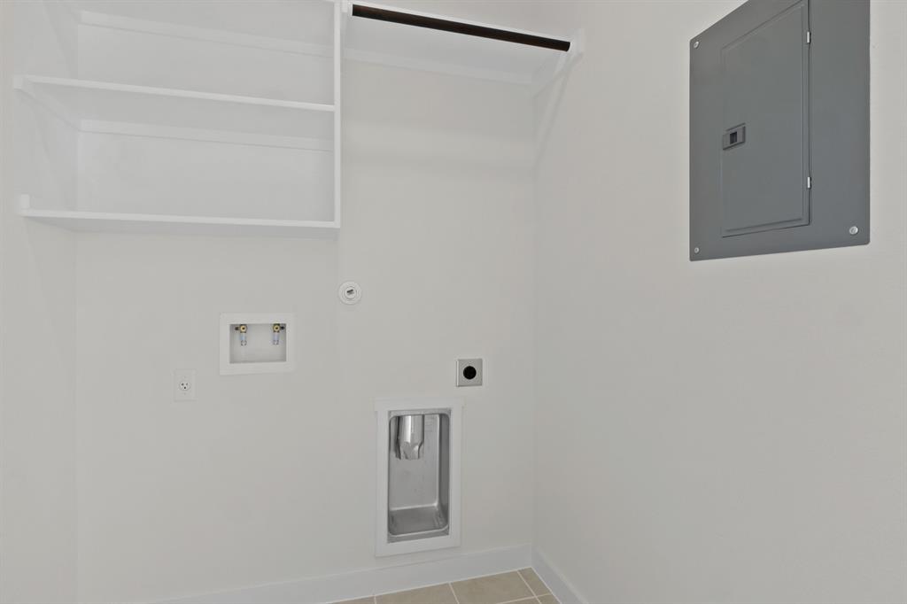 317 Millwood Road Lavon, TX 75166 - Photo 16 of 17 Utility room in the Pecan II home plan by Trophy Signature Homes – REPRESENTATIVE PHOTO