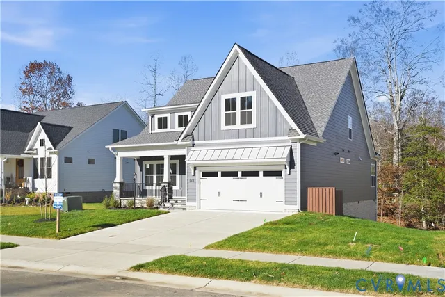 a view of a kitchen with a sink a refrigerator and a fireplace