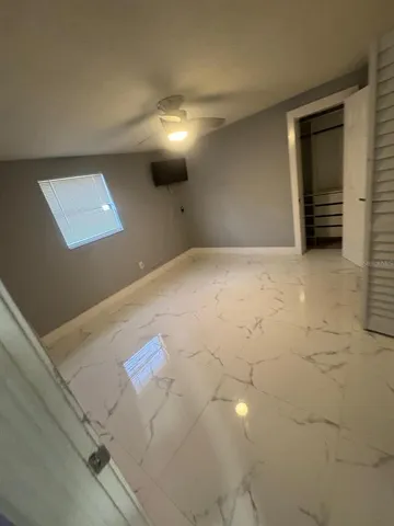 a bathroom with a sink a toilet and a shower