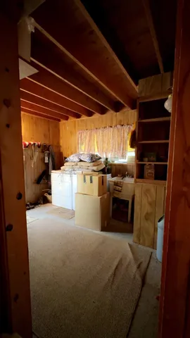 a kitchen with a stove and a refrigerator