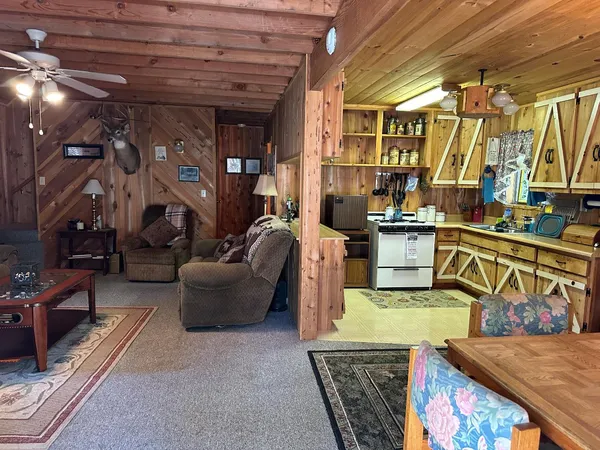 a living room with furniture and a couch
