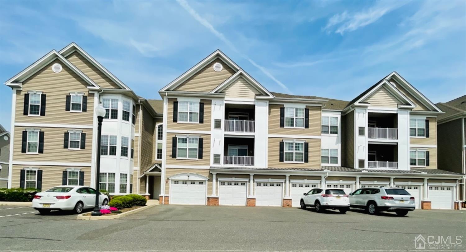 2332 Edward Stec Boulevard Edison, NJ 08837 - Photo 12 of 19 a car parked in front of a house