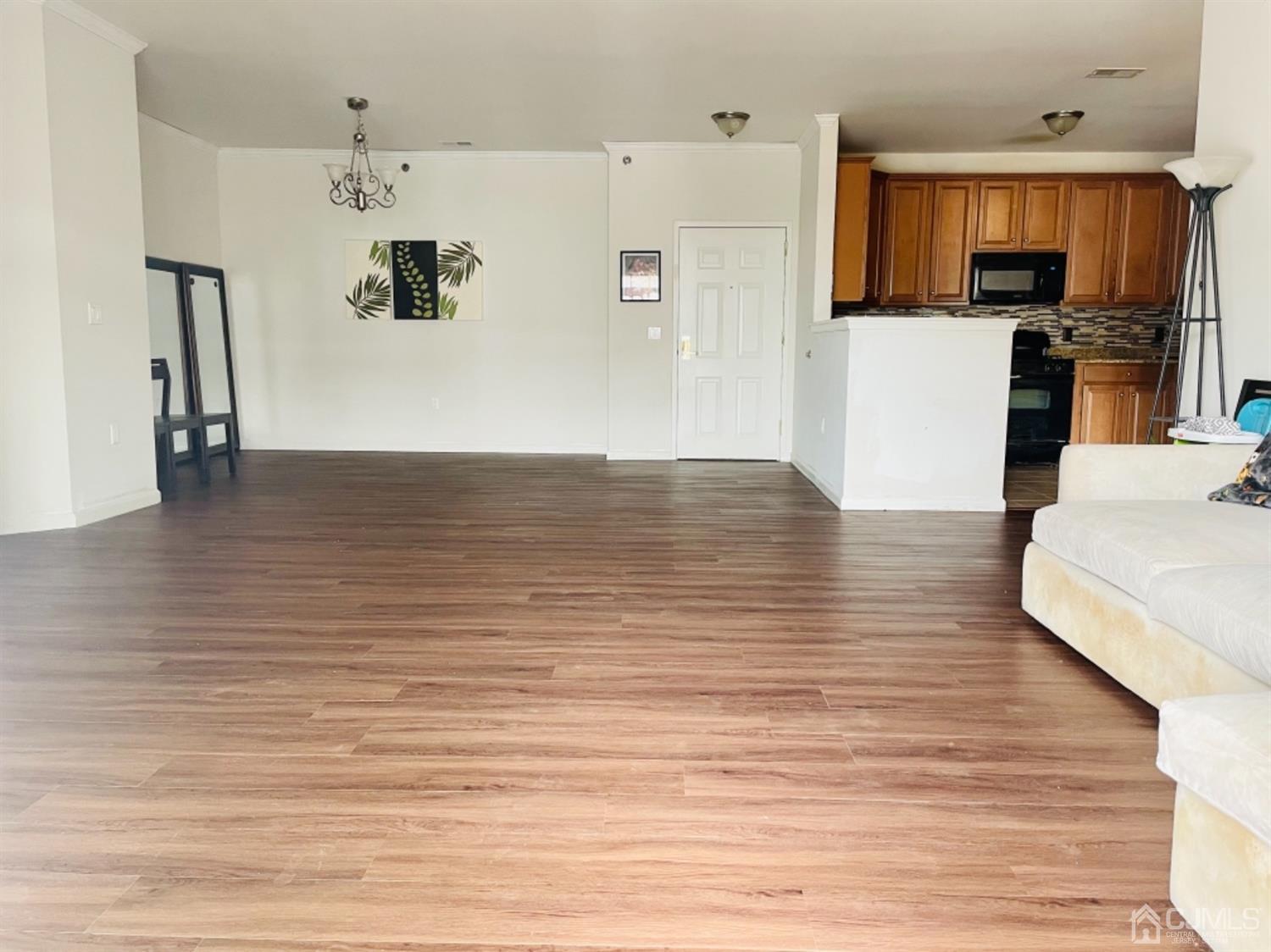 2332 Edward Stec Boulevard Edison, NJ 08837 - Photo 3 of 19 a view of kitchen with stainless steel appliances granite countertop a refrigerator and stove top oven