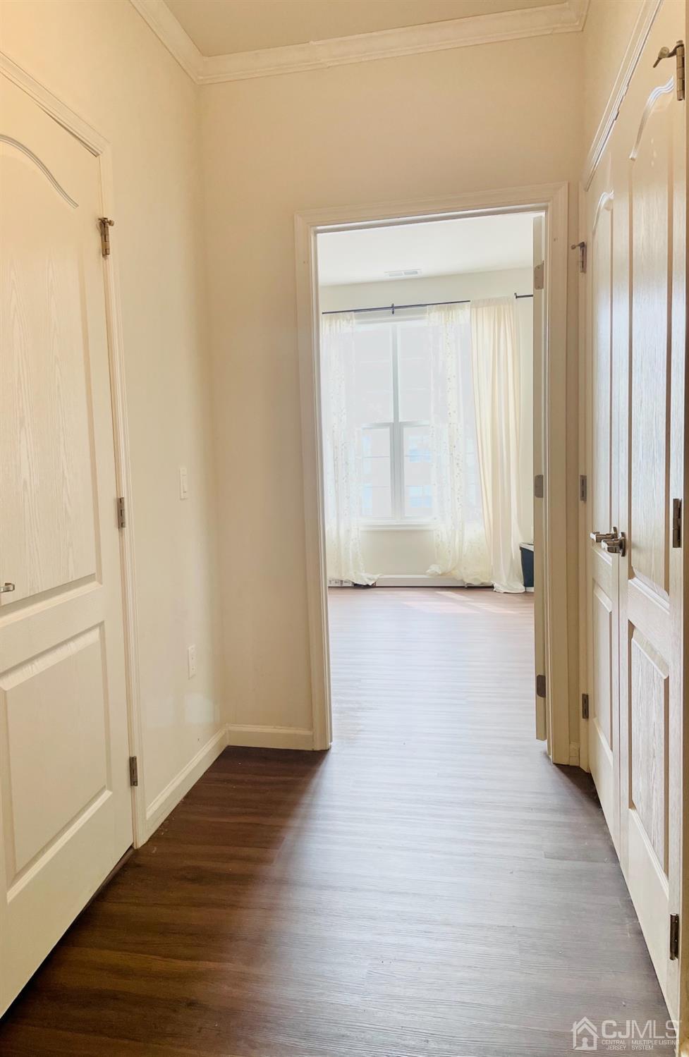 2332 Edward Stec Boulevard Edison, NJ 08837 - Photo 9 of 19 a view of hallway with wooden floor