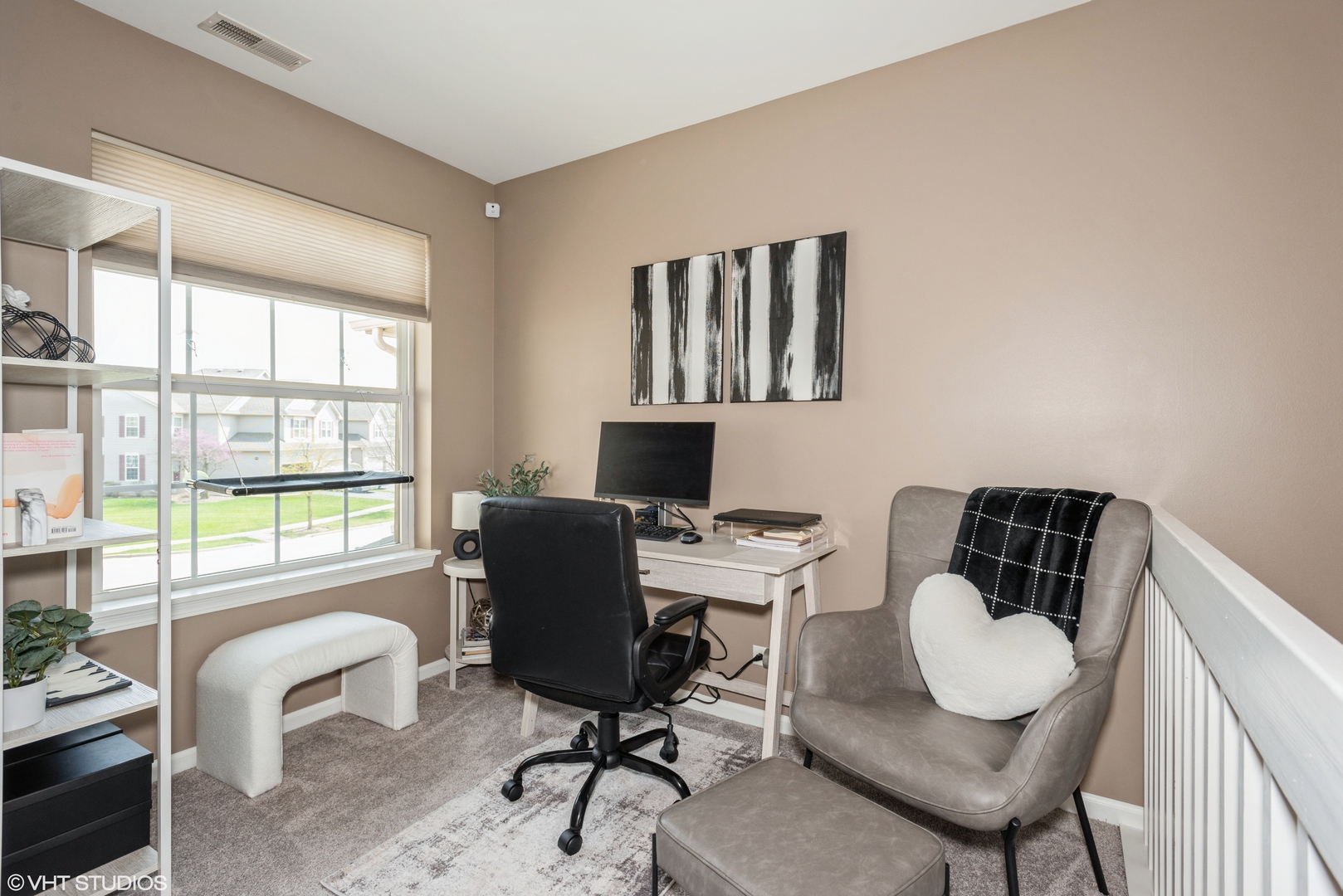 939 Oak Ridge Boulevard Elgin, IL 60120 - Photo 12 of 24 a view of a workspace with furniture and a window