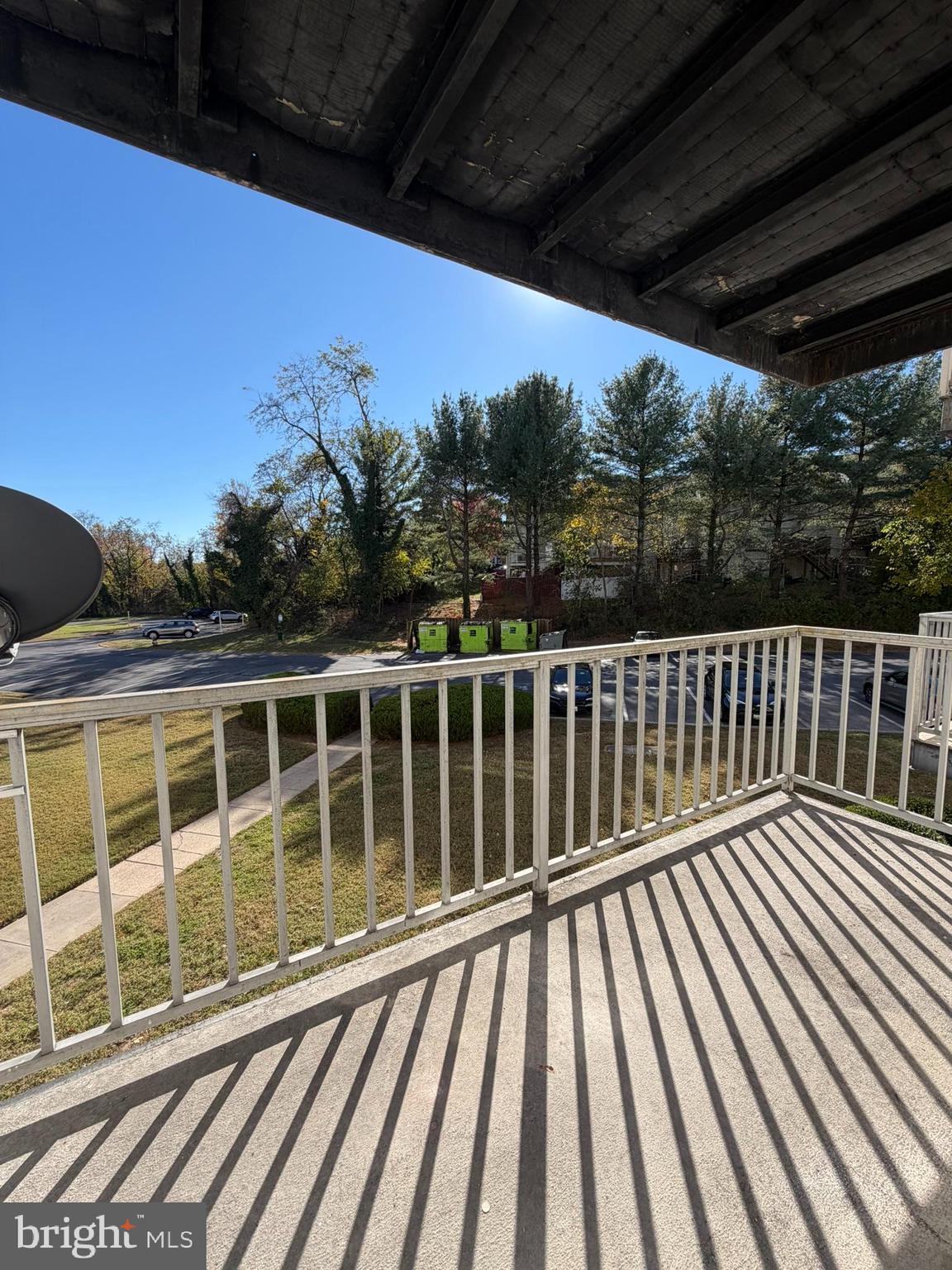 1009 Chillum Road, Unit 206 Hyattsville, MD 20782 - Photo 14 of 25 a view of balcony with wooden floor and fence