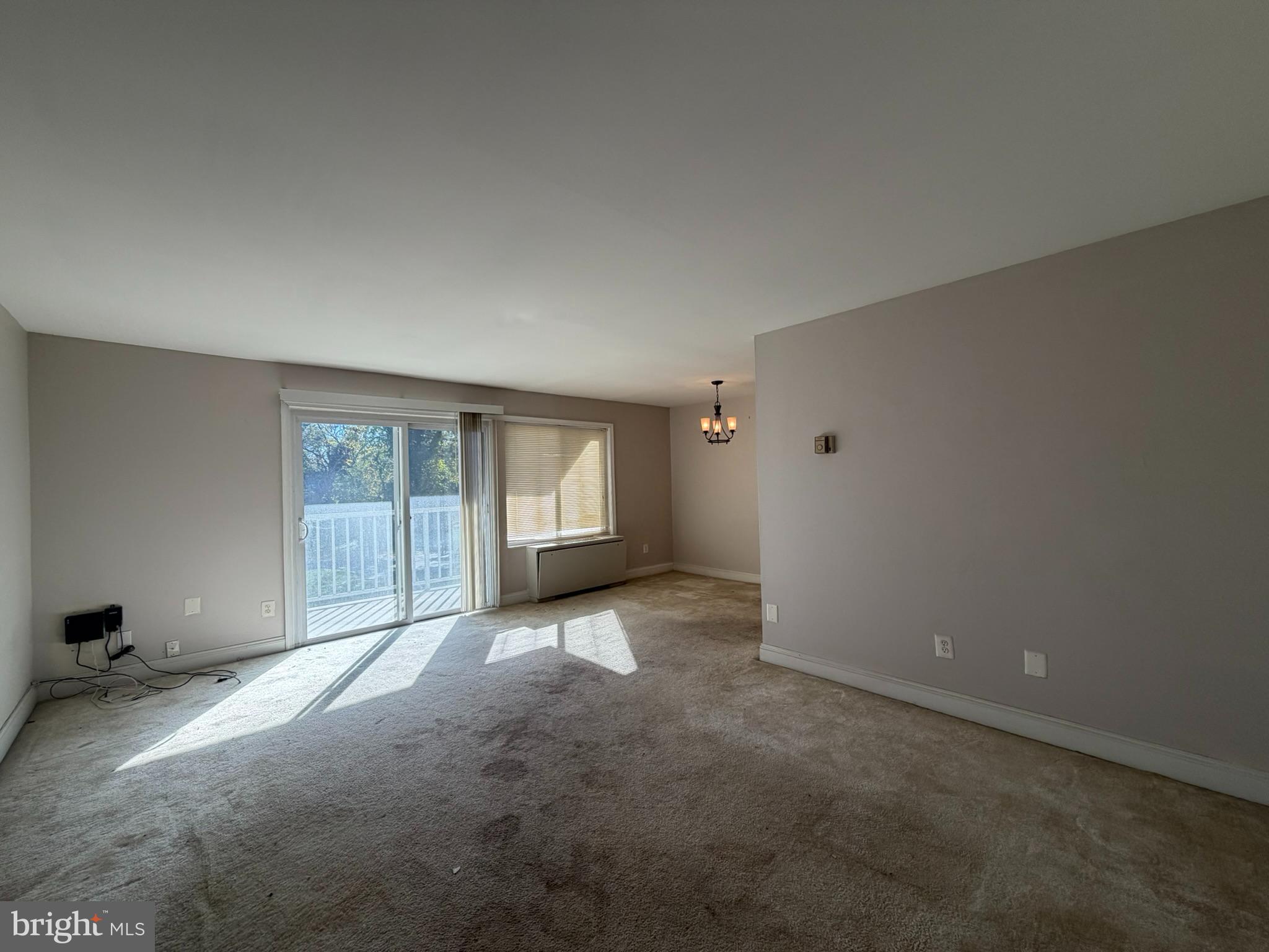 1009 Chillum Road, Unit 206 Hyattsville, MD 20782 - Photo 6 of 25 a view of a room with window and closet area