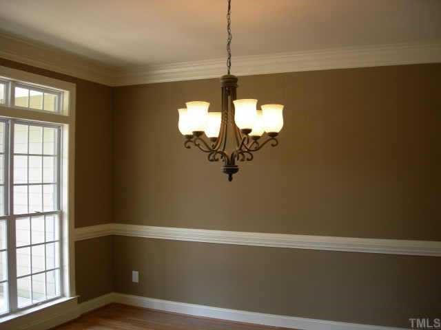 11519 Azari Court Raleigh, NC 27614 - Photo 2 of 10 a view of a small space with wooden floor and a window