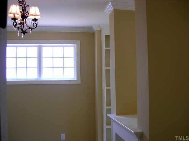11519 Azari Court Raleigh, NC 27614 - Photo 7 of 10 a view of hallway with chandelier