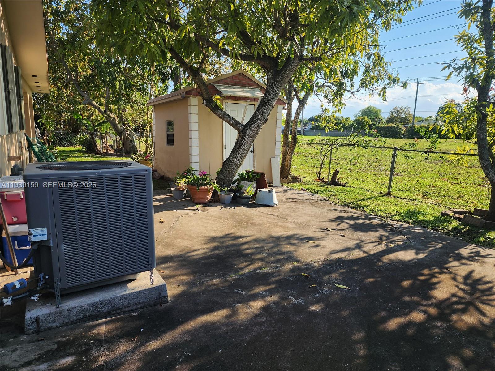 7344 Southwest 135th Court Miami, FL 33183 - Photo 15 of 24 a view of a house with a yard