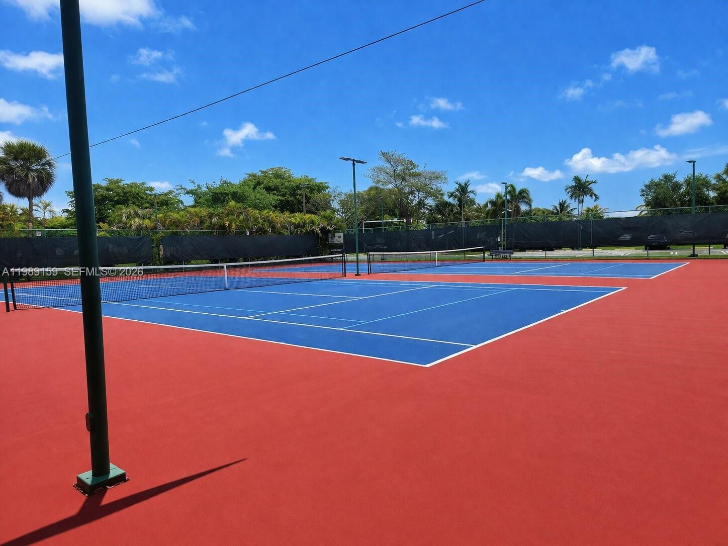 7344 Southwest 135th Court Miami, FL 33183 - Photo 21 of 24 a view of a tennis court