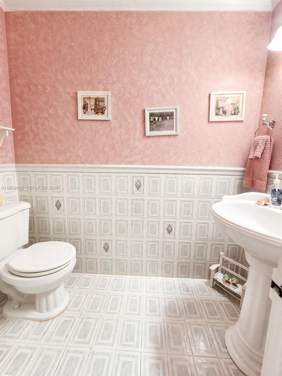 7344 Southwest 135th Court Miami, FL 33183 - Photo 9 of 24 a bathroom with a toilet sink and shower