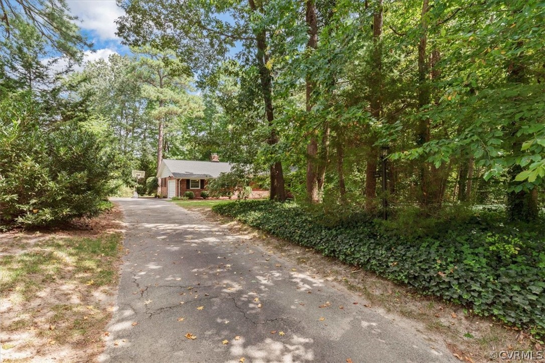14250 Riverside Drive Ashland, VA 23005 - Photo 1 of 45 Nestled off the road for privacy, welcome home!
