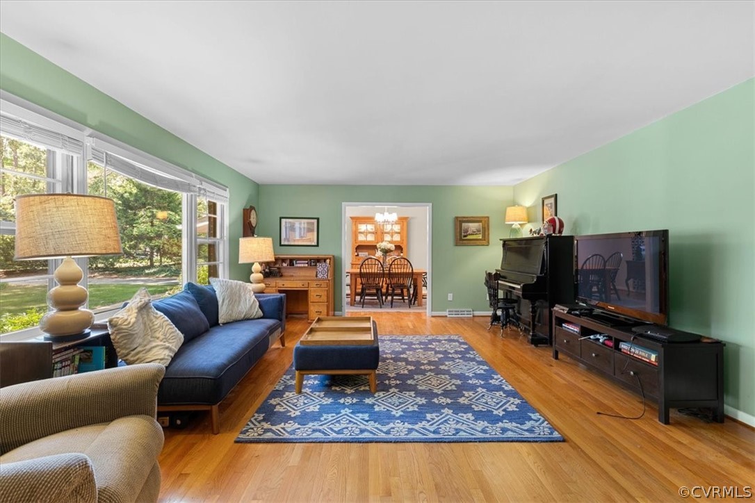 14250 Riverside Drive Ashland, VA 23005 - Photo 10 of 45 Hardwood floors and fireplace