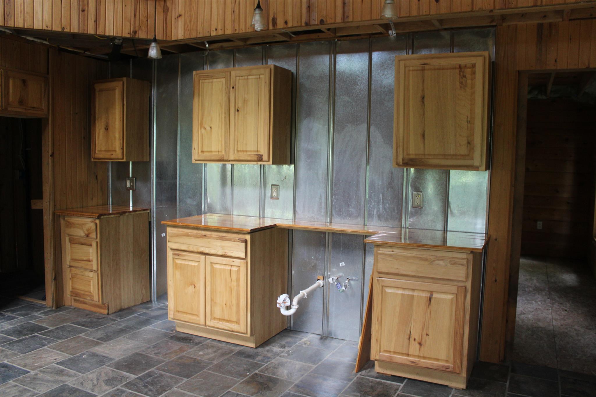 1137 Walden Ridge Road Manchester, TN 37355 - Photo 8 of 23 a kitchen with a refrigerator and cabinets