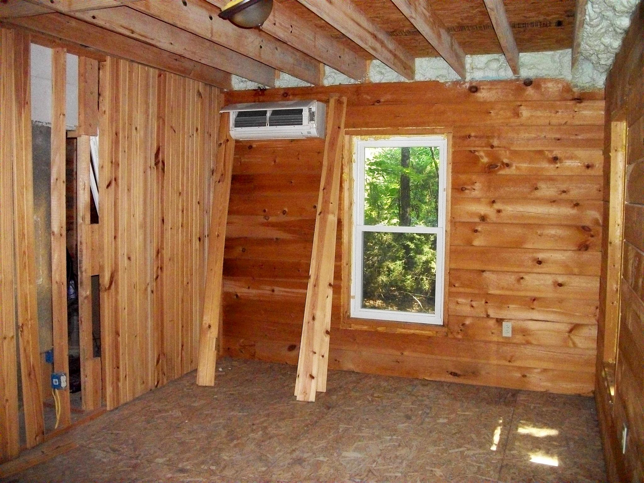1137 Walden Ridge Road Manchester, TN 37355 - Photo 10 of 23 a view of a room with wooden walls and windows