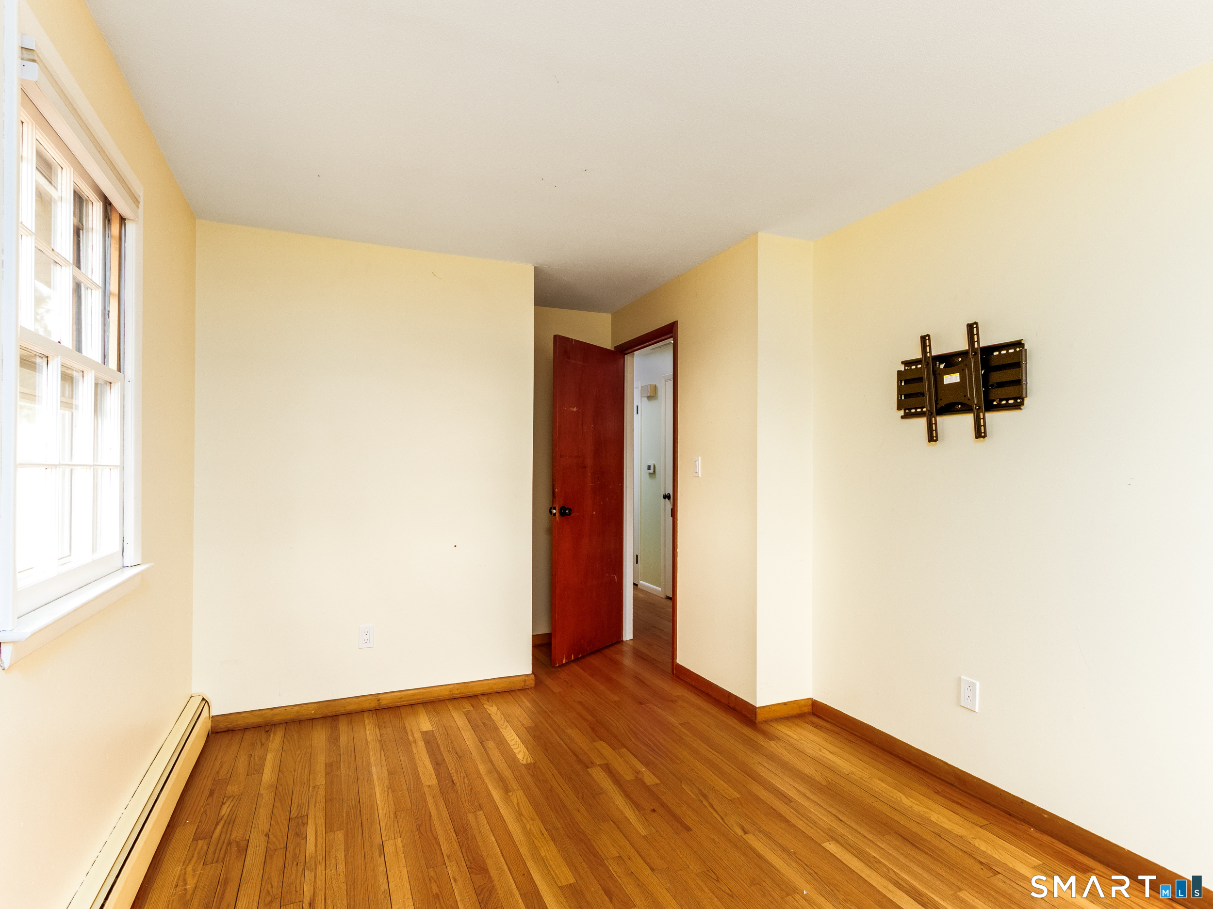9 Empire Avenue Meriden, CT 06450 - Photo 18 of 31 a view of empty room with wooden floor