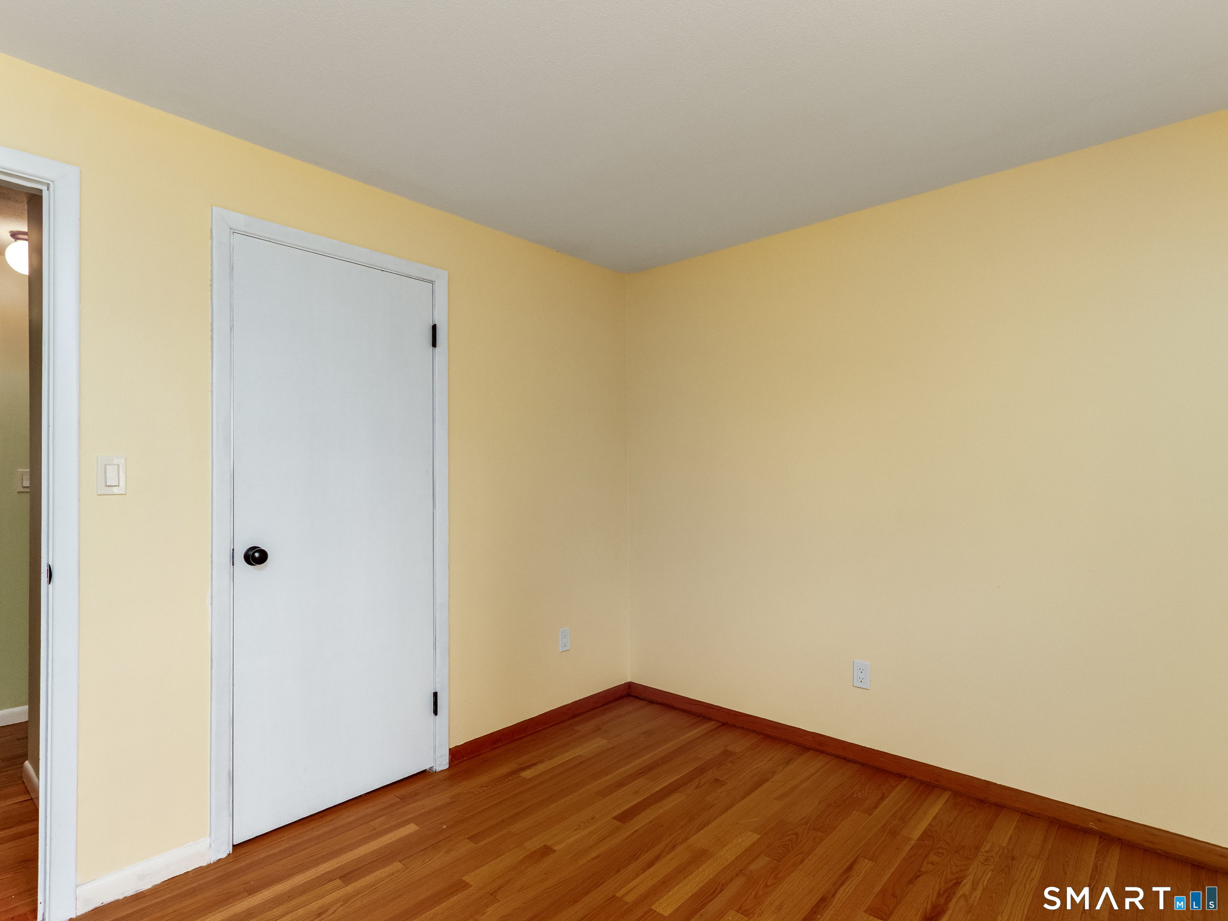9 Empire Avenue Meriden, CT 06450 - Photo 22 of 31 a view of empty room with wooden floor