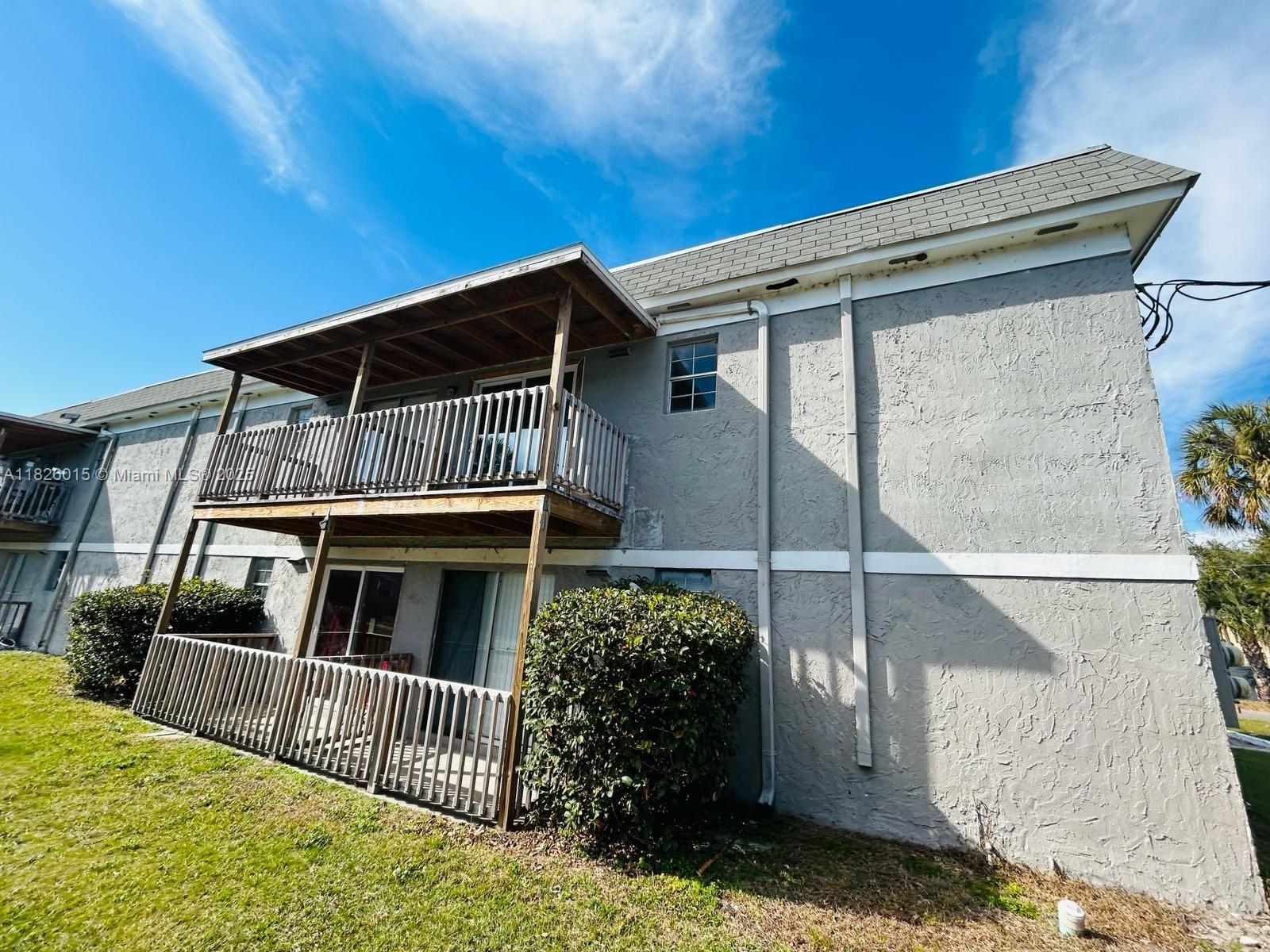 2775-l B L B McLeod Road, Unit B Orlando, FL 32805 - Photo 2 of 13 a view of house with a porch