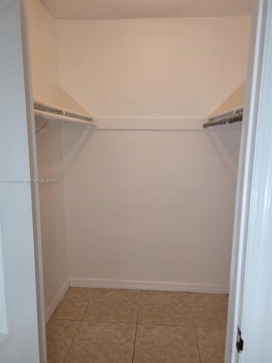2775-l B L B McLeod Road, Unit B Orlando, FL 32805 - Photo 25 of 28 a view of an empty walk in closet