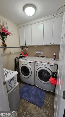 a view of a house with a backyard porch and a slide