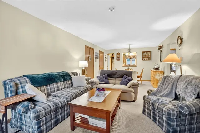 a living room with furniture and a couch