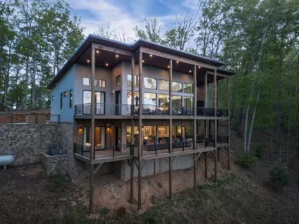 a front view of house with yard and seating space