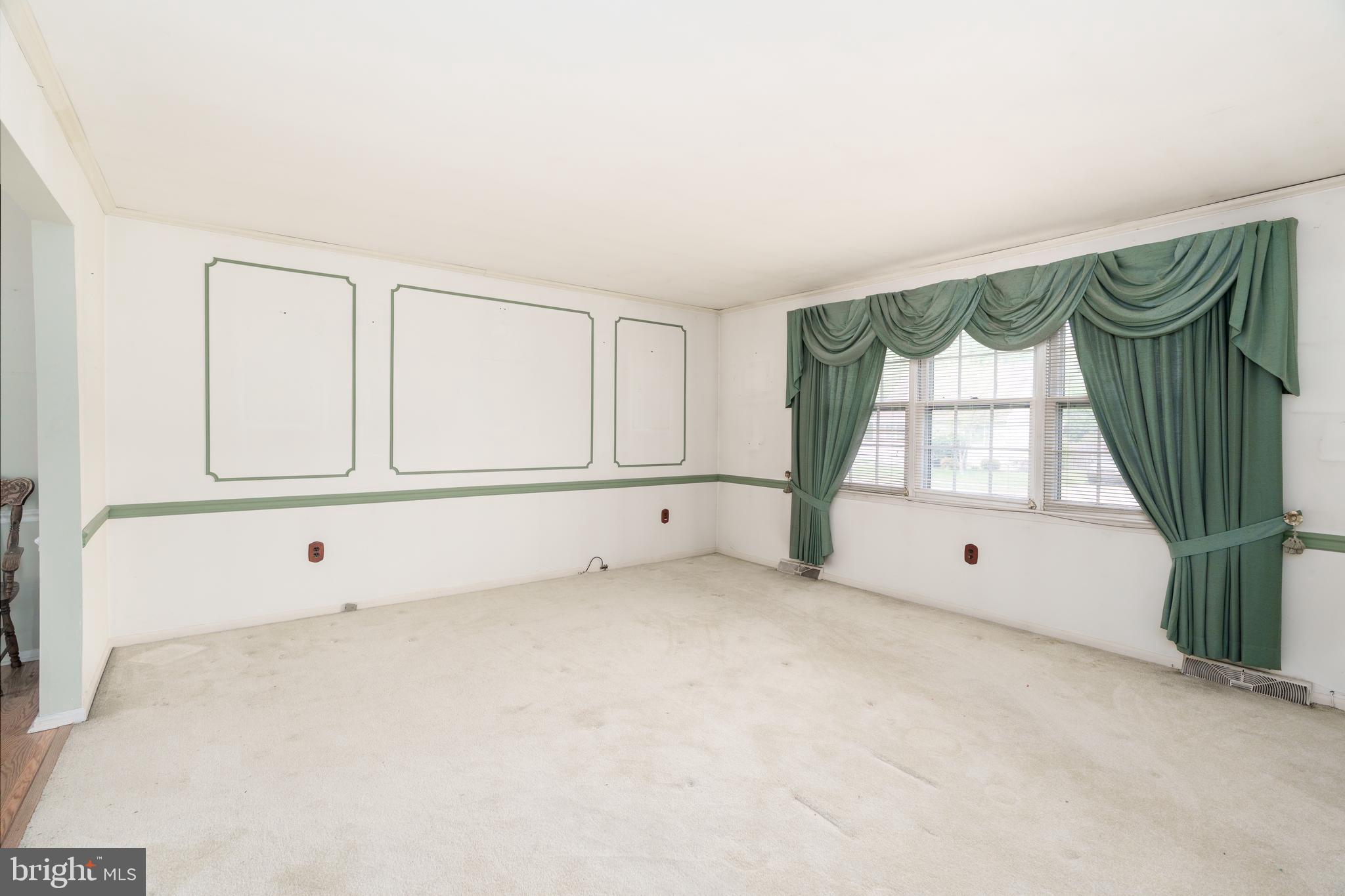 112 Park Towne Drive Elkton, MD 21921 - Photo 4 of 18 a view of an empty room with a window