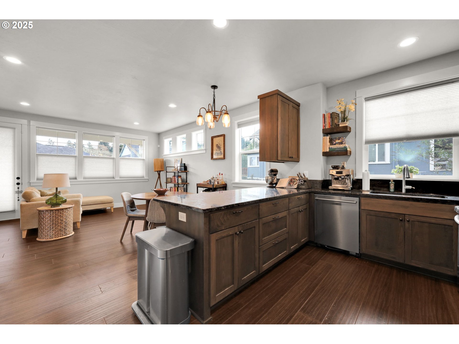 2819 Adams Street Eugene, OR 97405 - Photo 14 of 44 a kitchen with sink and wooden cabinets