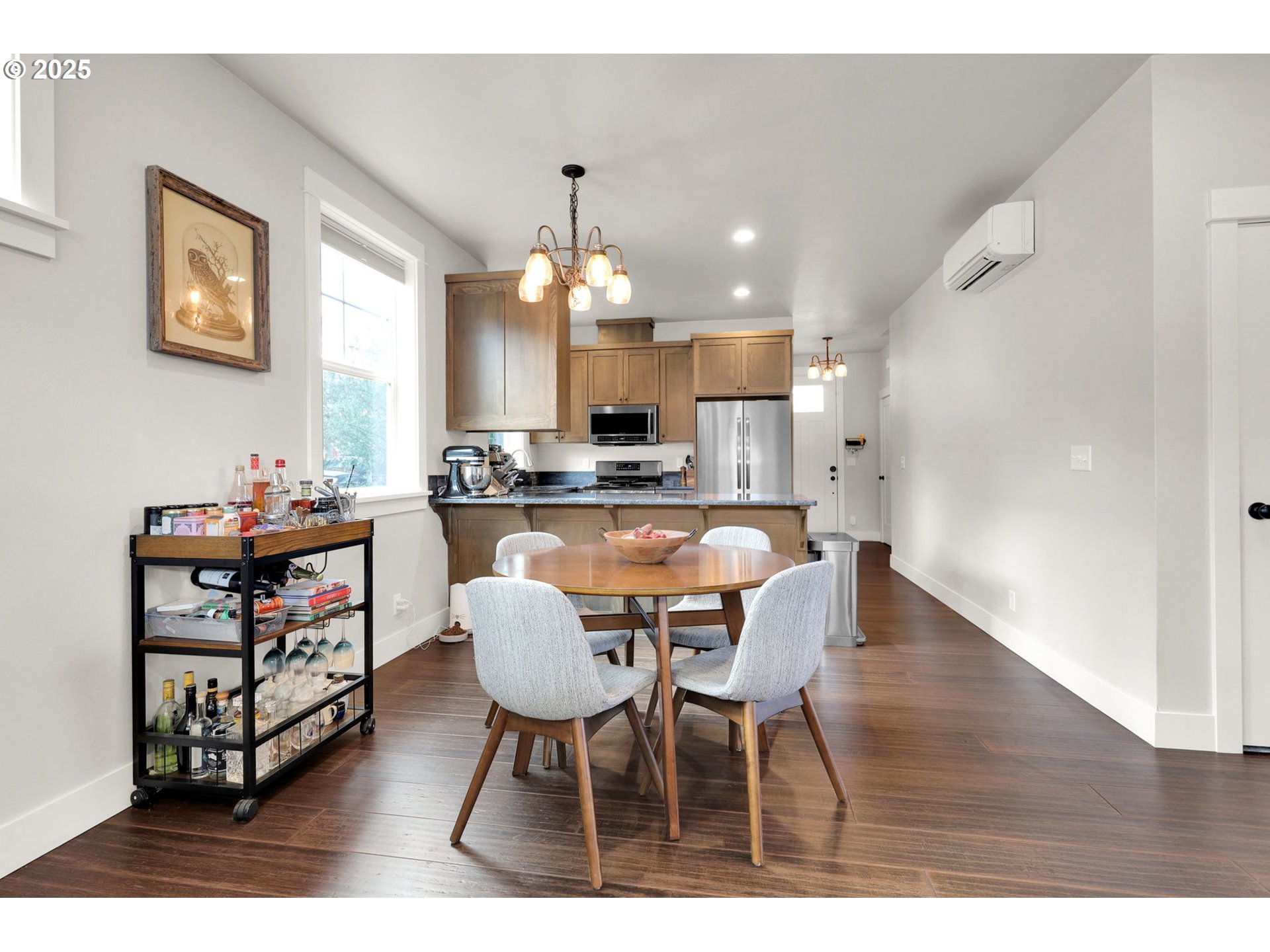 2819 Adams Street Eugene, OR 97405 - Photo 17 of 44 a view of kitchen with cabinets and wooden floor