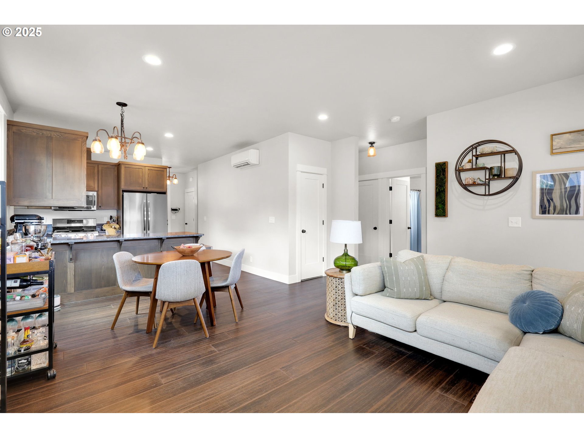 2819 Adams Street Eugene, OR 97405 - Photo 20 of 44 a living room with furniture and kitchen view
