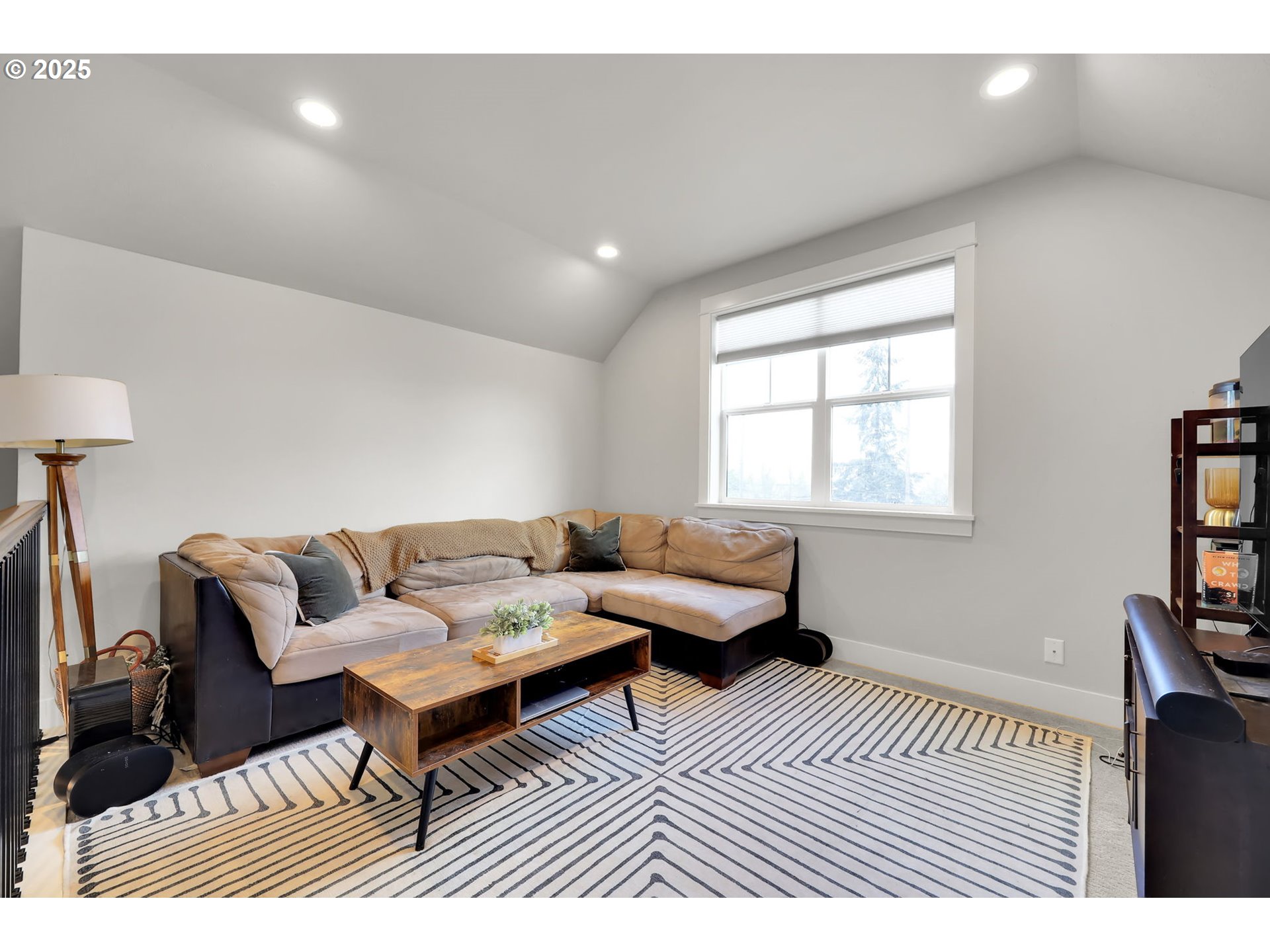 2819 Adams Street Eugene, OR 97405 - Photo 24 of 44 a living room with furniture and a rug