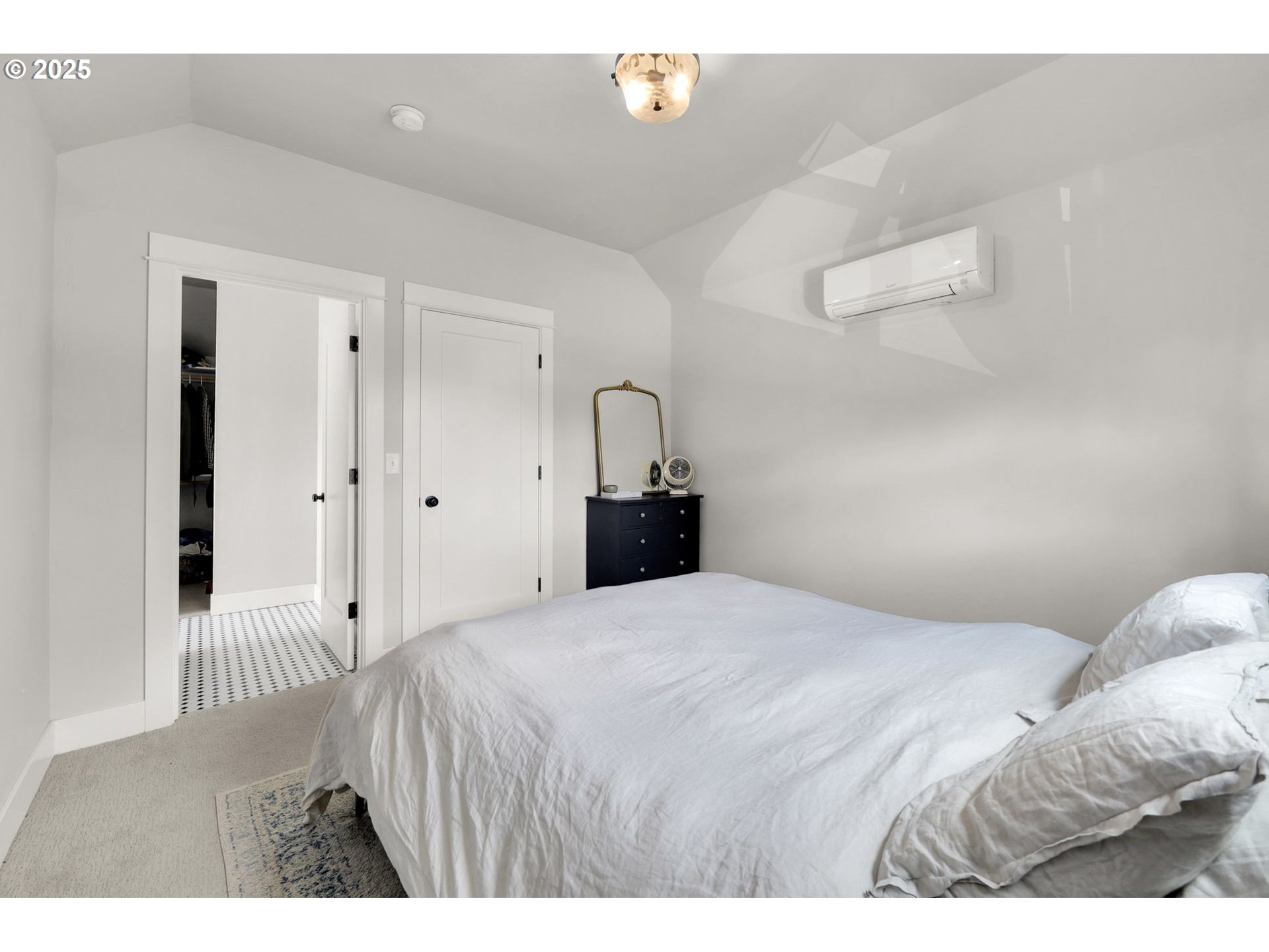 2819 Adams Street Eugene, OR 97405 - Photo 29 of 44 a bedroom with a bed and a cabinets