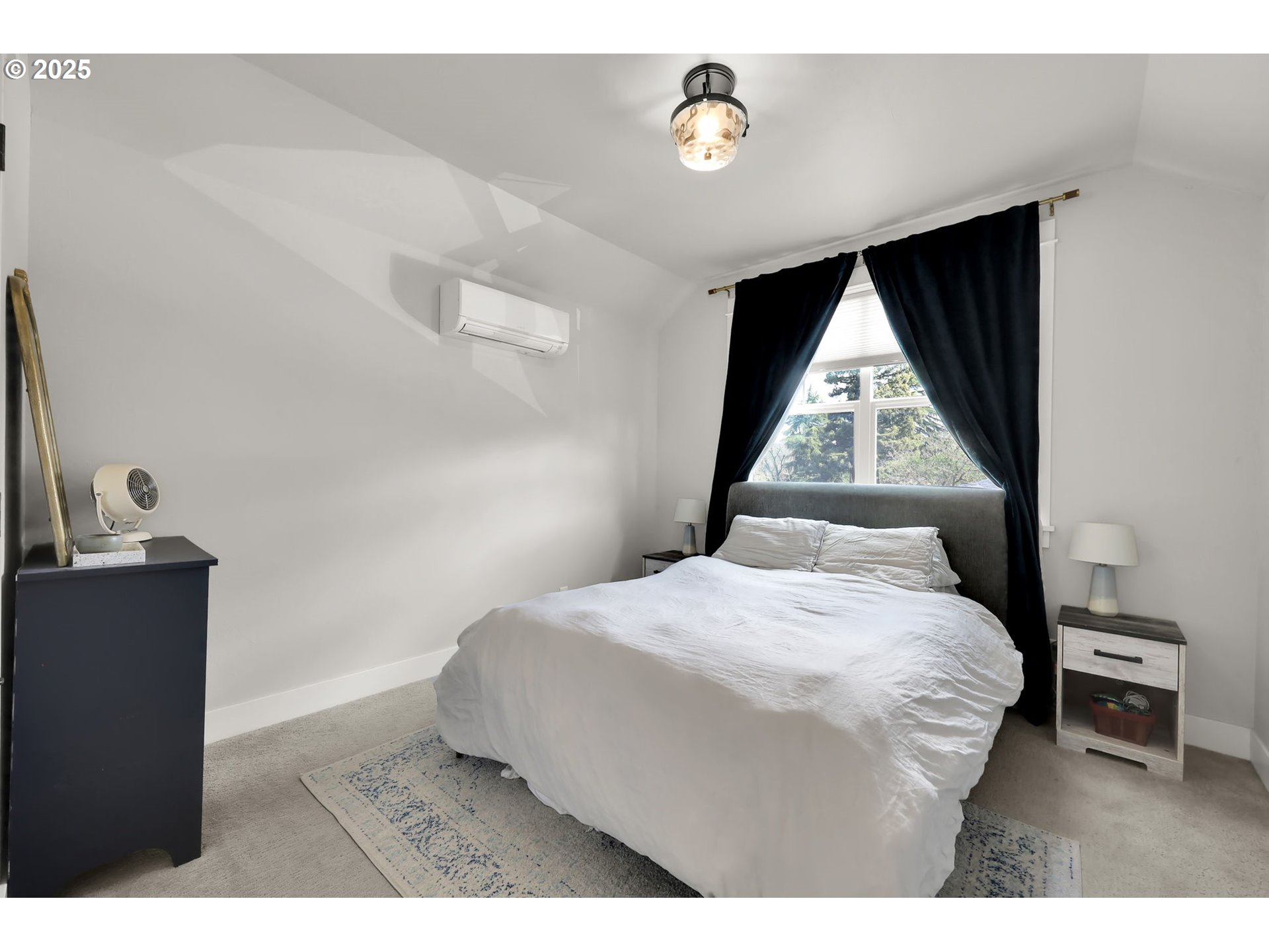 2819 Adams Street Eugene, OR 97405 - Photo 30 of 44 a bedroom with a bed and a large window