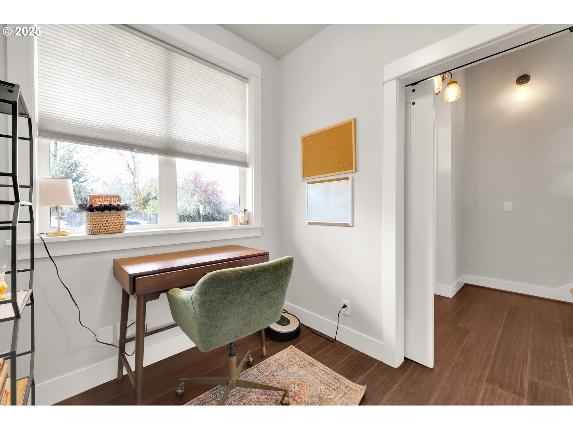 2819 Adams Street Eugene, OR 97405 - Photo 31 of 44 a living room with a chair a table and a window