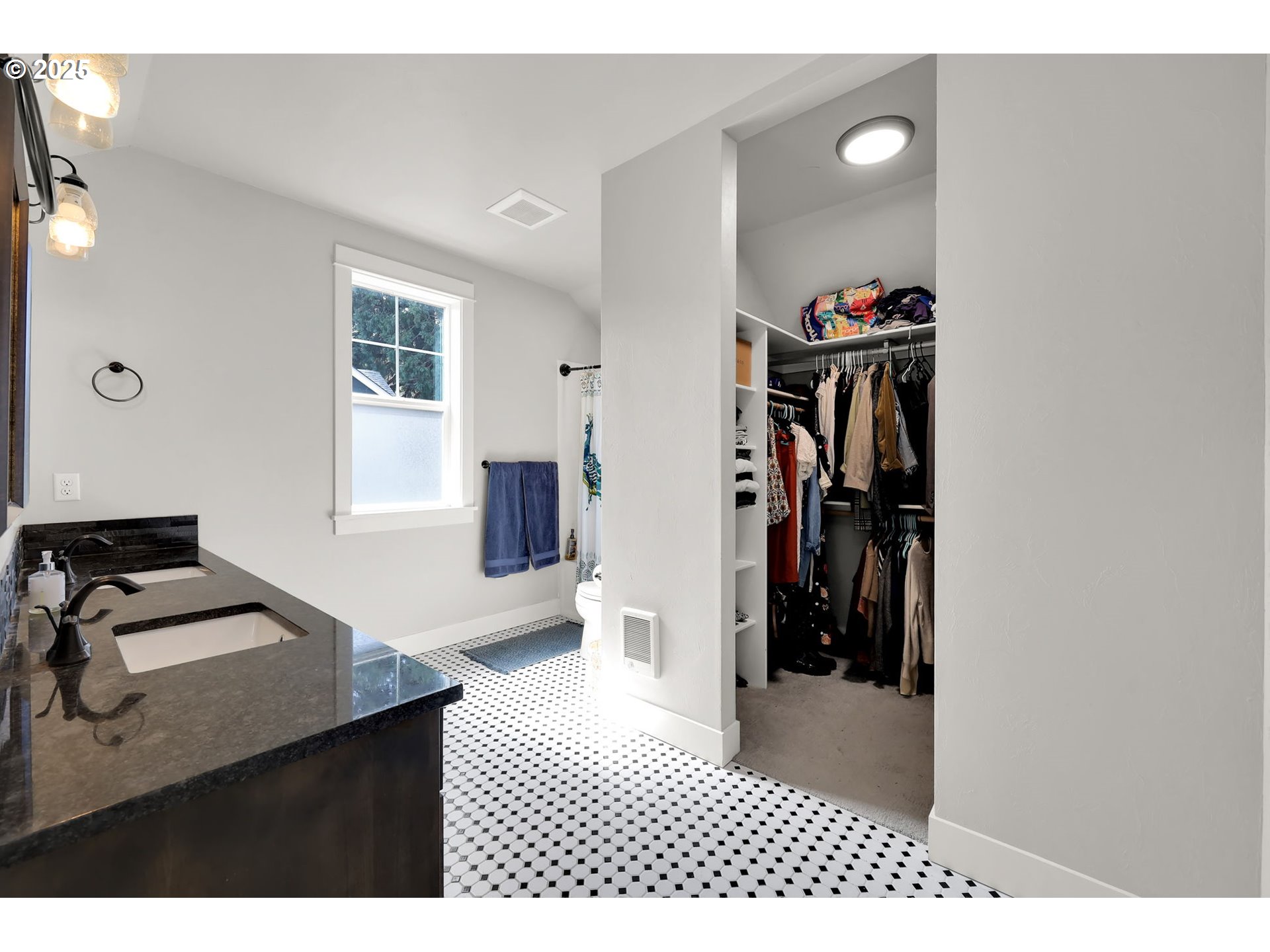 2819 Adams Street Eugene, OR 97405 - Photo 33 of 44 a bedroom with a bed and a window