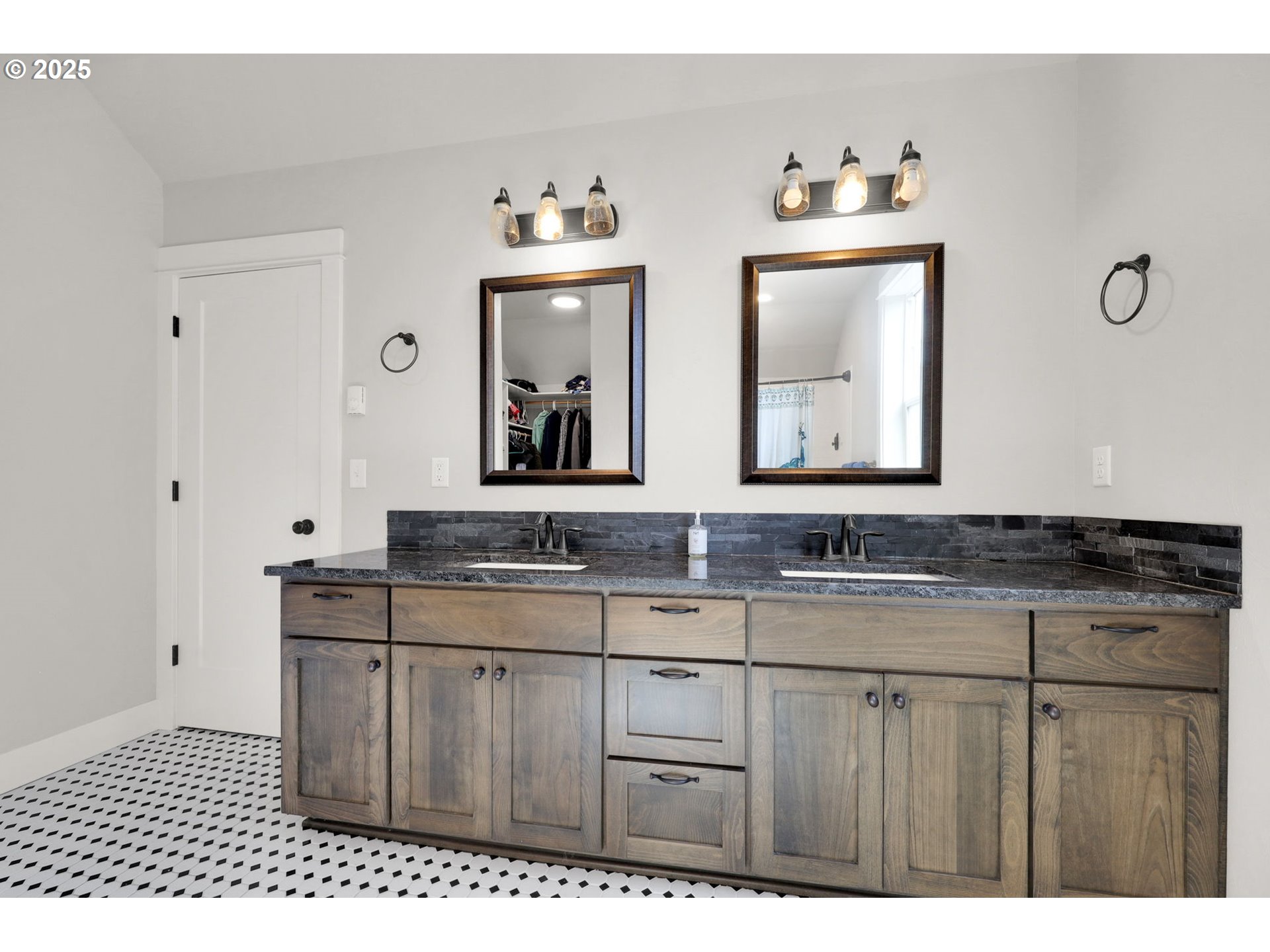 2819 Adams Street Eugene, OR 97405 - Photo 35 of 44 a bathroom with a granite countertop sink mirror and