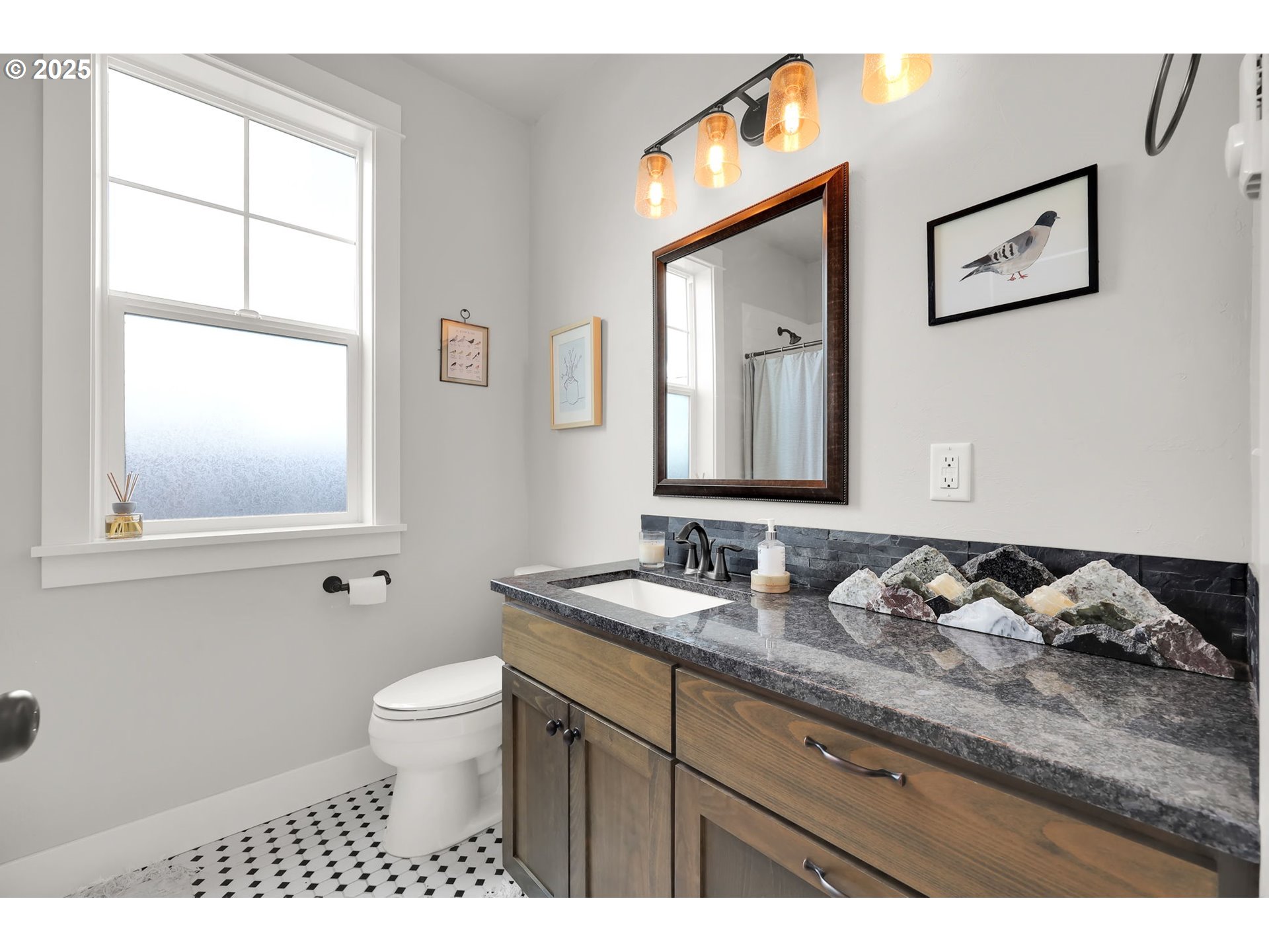 2819 Adams Street Eugene, OR 97405 - Photo 39 of 44 a bathroom with a granite countertop sink mirror vanity and toilet