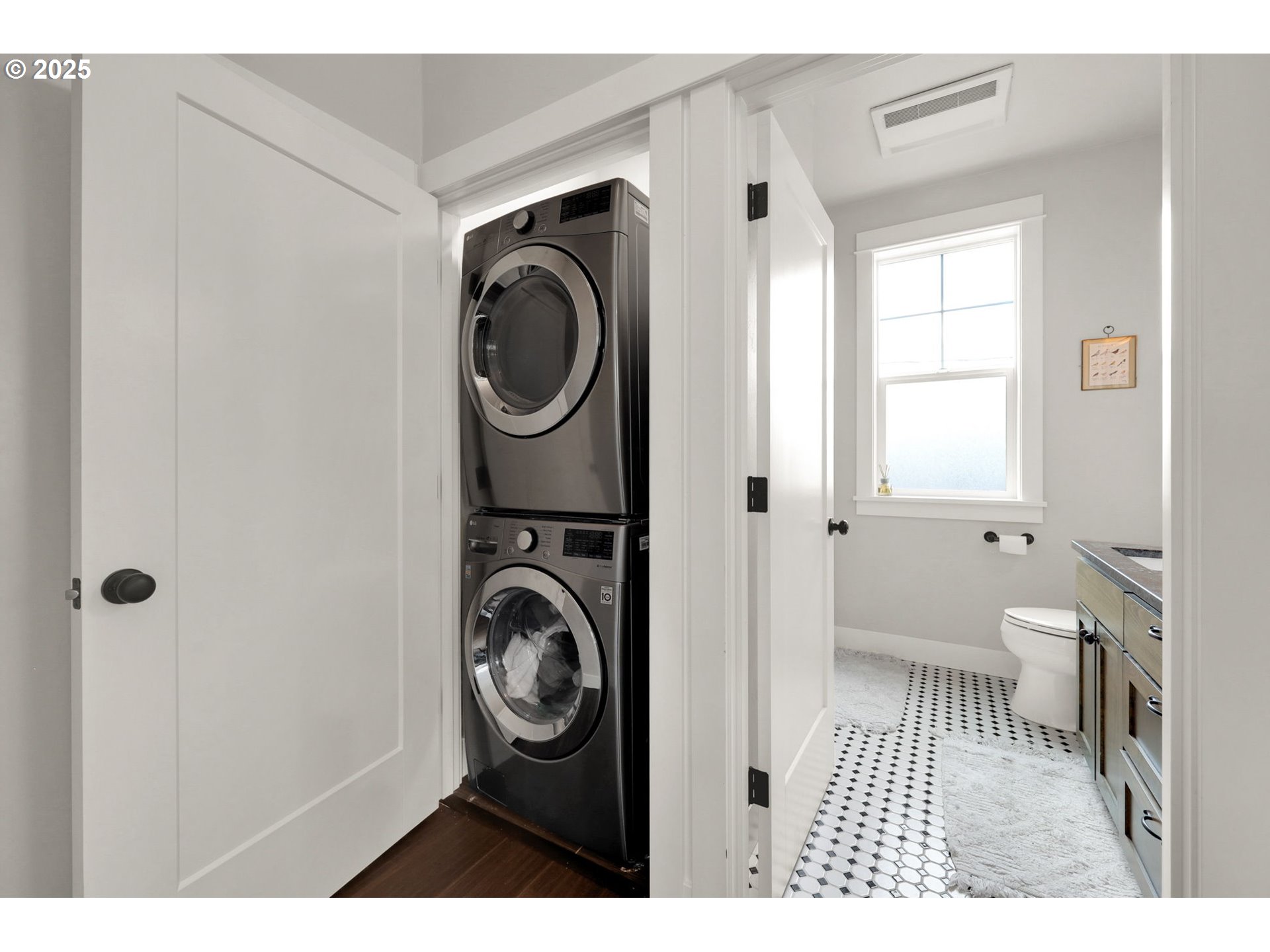 2819 Adams Street Eugene, OR 97405 - Photo 40 of 44 a view of a hallway with washer and dryer