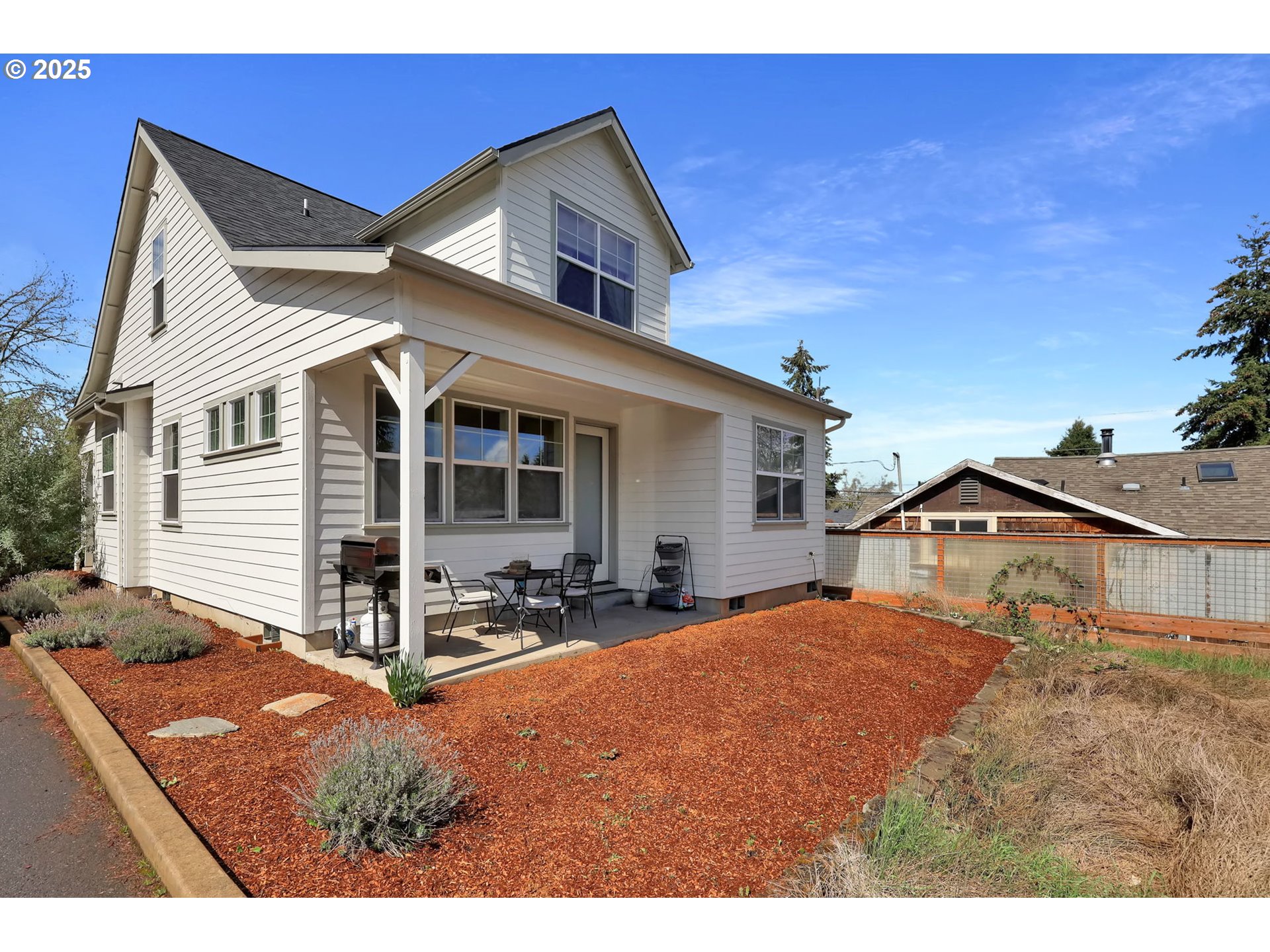 2819 Adams Street Eugene, OR 97405 - Photo 41 of 44 a front view of a house with a patio