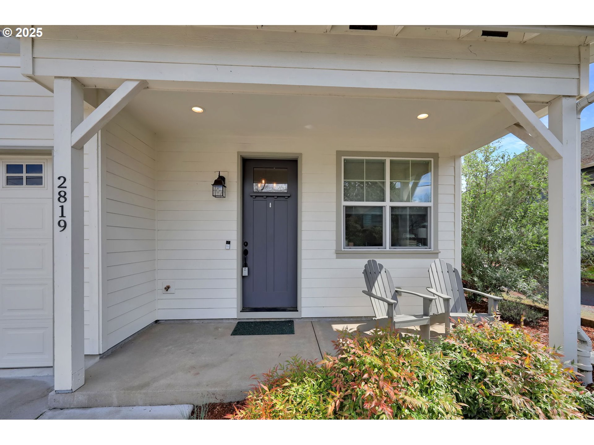 2819 Adams Street Eugene, OR 97405 - Photo 5 of 44 a view of front door and potted plants