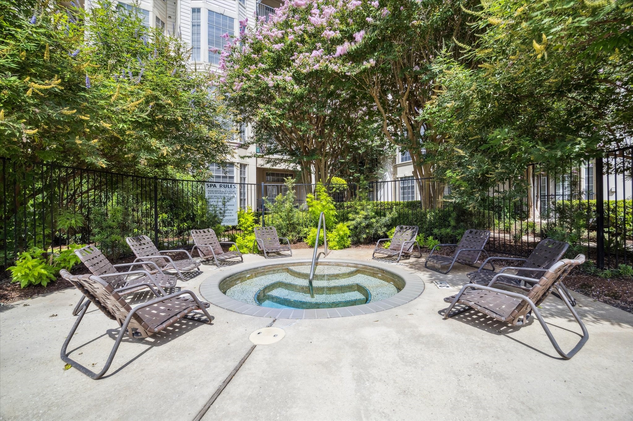 5353 Memorial Drive, Unit 3038 Houston, TX 77007 - Photo 16 of 27 a swimming pool with outdoor seating and plants