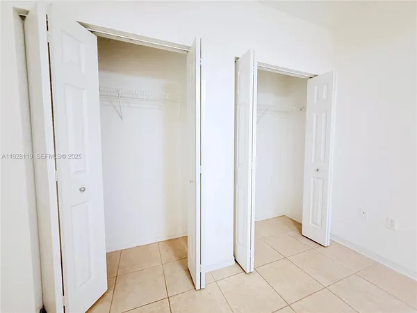 a view of an empty room with window