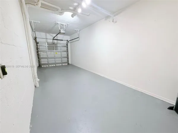 a view of a bedroom from a hallway