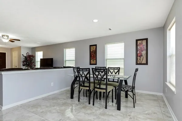 a view of a dining room with furniture