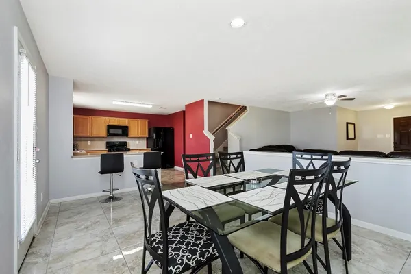 a view of a dining room with furniture
